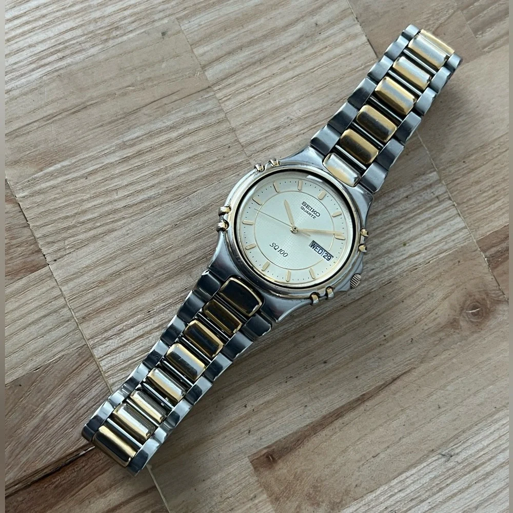 Seiko SQ 100 Rare Vintage Men’s Watch Light Gold-Tone Dial Two-Tone Bracelet